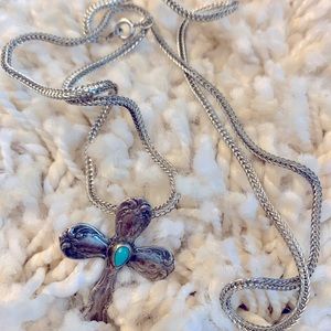 Silver cross with turquoise center